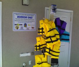 Coast Guard Aux Life Vest Stand at Tanasi Dock 2013